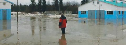 Man standing in knee deep water